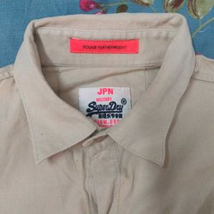 A Professional Shirt With Plain Tan Color