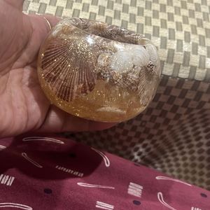 resin container embedded seashells and glitter