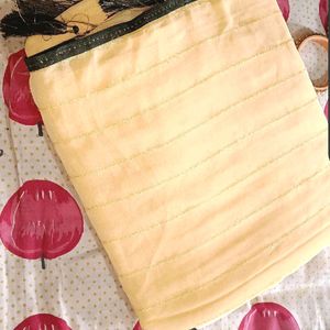 Cream Colour Shimmering Saree With Stitched Blouse