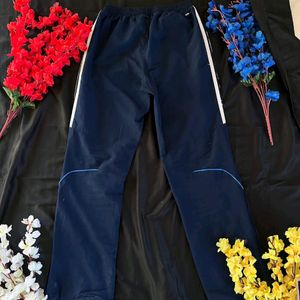 Adidas blue trackpants