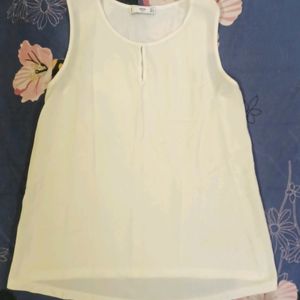 White Sleeveless Tops