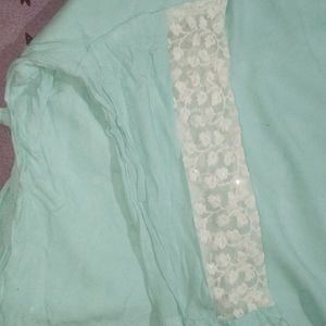 Top sea green colour with white sleeve round neck