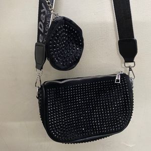 Black Coin Sling Bag.