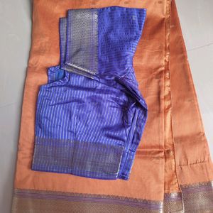 Orang And Blue Saree