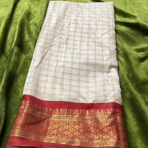 White Saree With Red Boarder