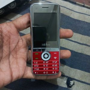 Moses E100 With Free 2 Gb Sd Card Earphones Chager