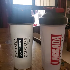 Two Plastic Shakers In Good Condition