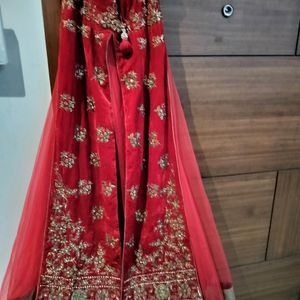 A Red Colour Suit-type Lehenga