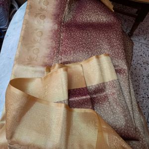 Golden Zari Knitting Work On Brown Base saree