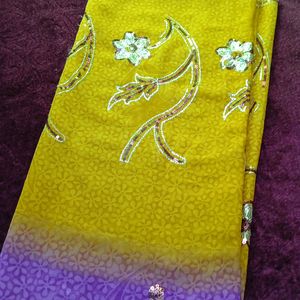 Yellow And Violet Georgette Saree