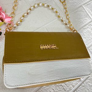 Olive green pearl handle sling bag
