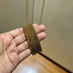 Golden Bangles 8 Pcs