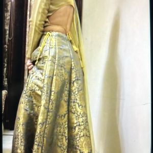 Brocade Lehnga With Golden Backless Choli