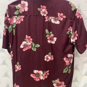 Floral shirt.