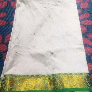 White Saree With Green And Golden Design