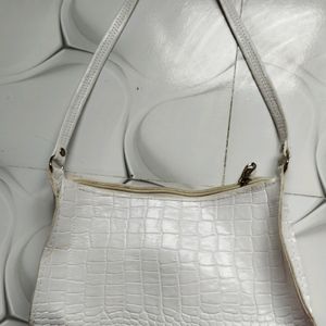 Bag With Nude Shade Lipstick