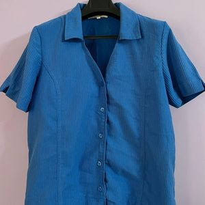 A Blue UNISEX Shirt.