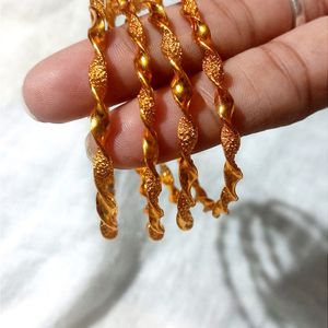 Golden Bangles (4 Pieces)