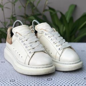 ALEXANDER MCQUEENWHITE LEATHER SNEAKERS WITH LOGO