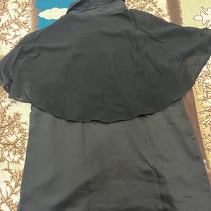 Black sleeveless satin shirt