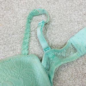 Light Green Color Puffy Bra Under Plastic Frame