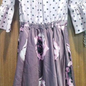 Purple frock . Dotted and flower print dress