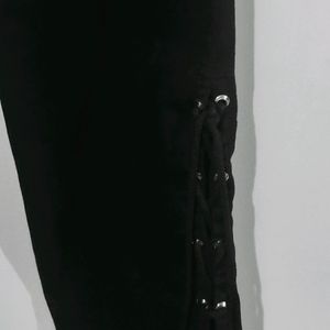 Flared Black Jeans With Cut Design