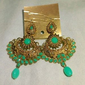 Green Dress With Bangles And Earrings