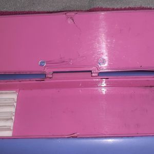 A pencil box with white board