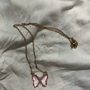 Pink Butterfly Pendant Along With Chain Attached