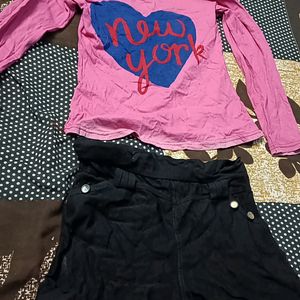 Pink Top And Black Shorts