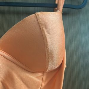 Pretty Padded Orange Trikini With Side Cuts