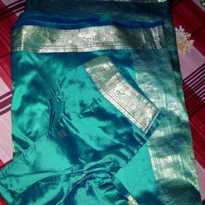 Festive Wear pure green silk sareee