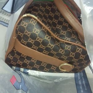 GUCCI DUFFLE HANDY+SLING@390 RS