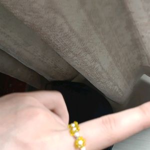 BEADED YELLOW RING FLOWER