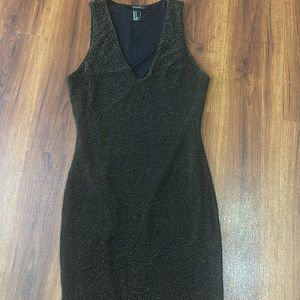 Black and golden shimmery dress in size M