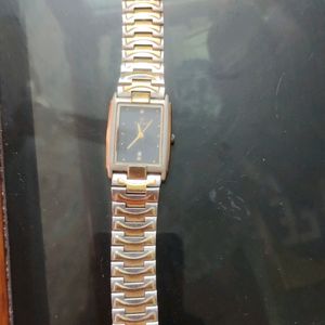 Titan Rose Gold Watch With Silver Dail