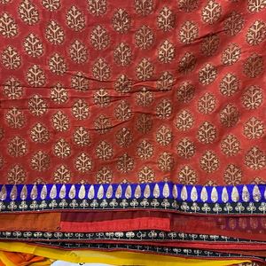 YELLOW ORANGE SHIFFON AND HEAVY EMBROIDERY SAREE