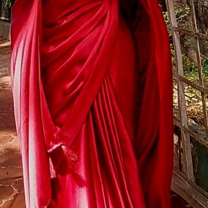 HOT RED SATIN SAREE WITH BLACK VELVET BLOUSE .