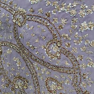 Beautiful detailed work saree purple for weddings and functions