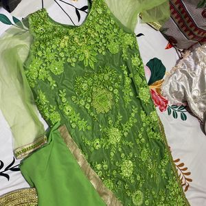 wedding suit with heavy material work