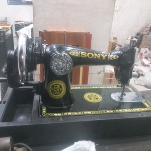 Sony Hand Hald Sewing Machine With Base