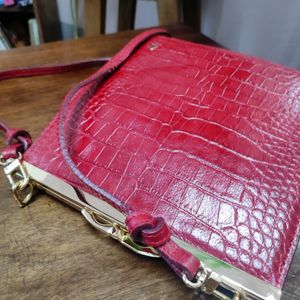Red Leather Sling Clip Bag