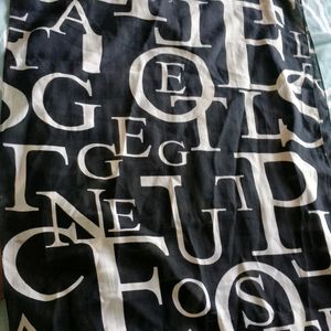 Black Scarf With White Print Of Alphabets