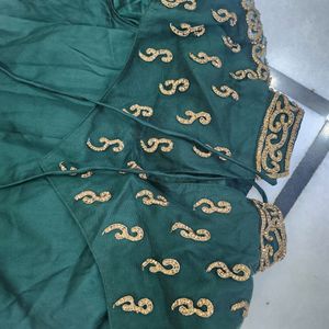 Luxurious Silk Dark Green Gown With Golden Stone