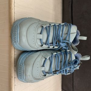 Sky Blue Pair Of Shoes