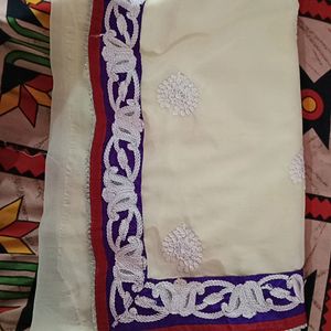 A Saree Half In Off White And rest Red