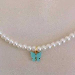 Set Of Pearl Butterfly Necklace