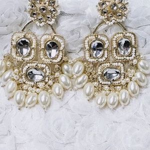 Trending Golden Earrings with Pearls.