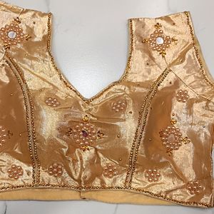 stone worked golden blouse